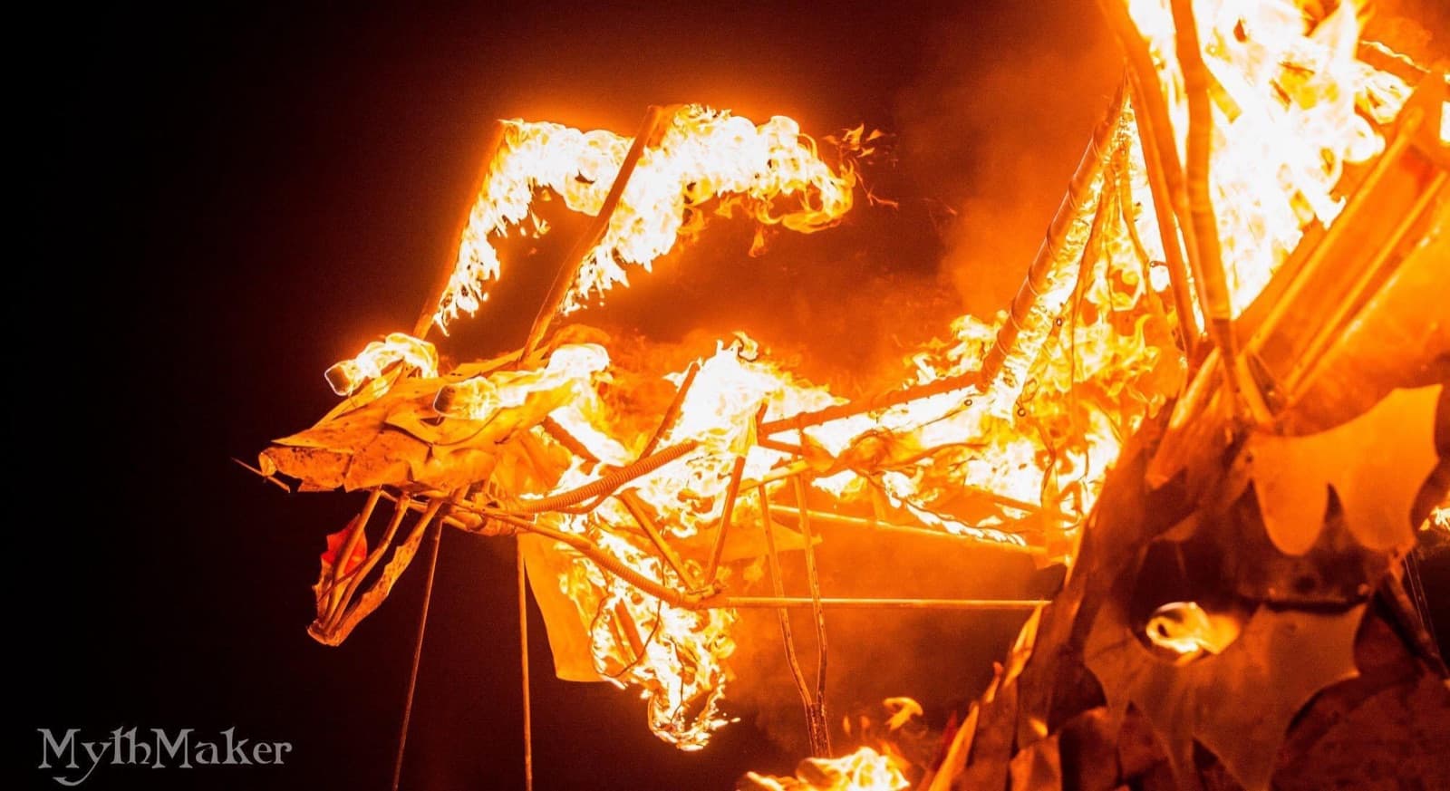 The great dragon effigy ablaze against the night